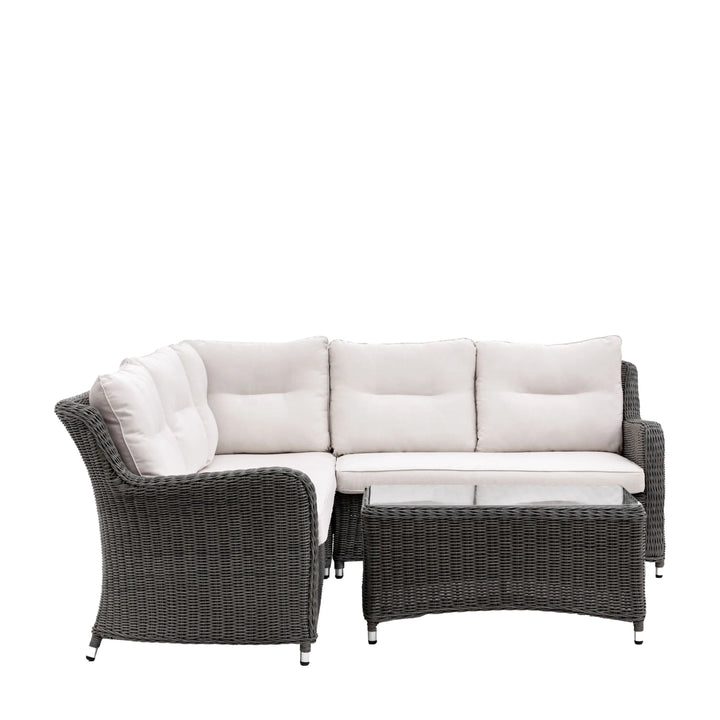 Complete garden furniture set with wicker corner sofa and matching coffee table