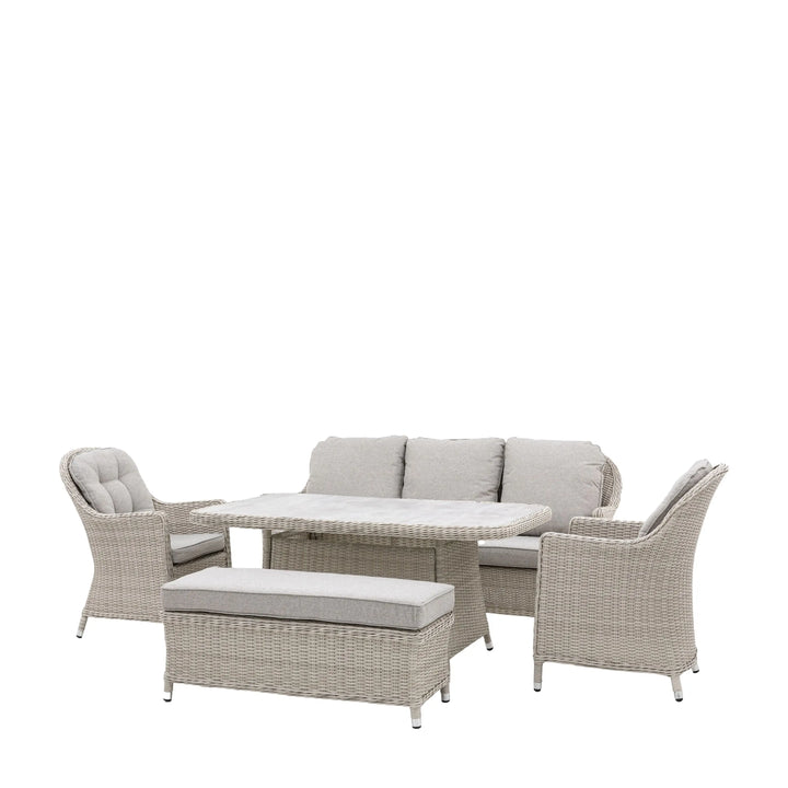 “Modern rattan outdoor dining set with bench, sofa, and armchairs in neutral tones”