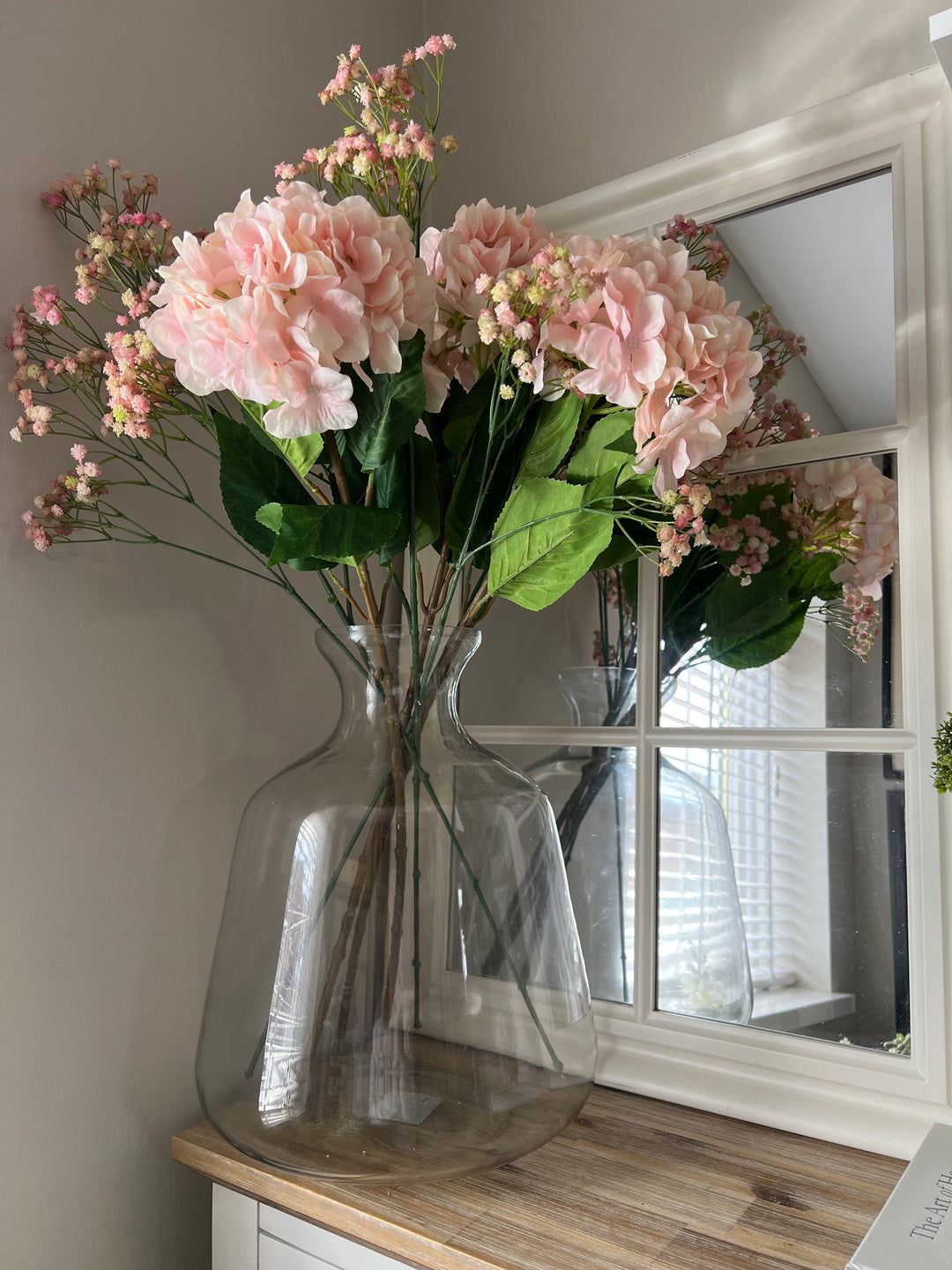 Luxury pink hydrangea and baby's breath arrangement in extra large glass vase